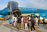 Từ ngày 1/7, hàng triệu hành khách đi máy bay sẽ được hưởng quyền lợi sau